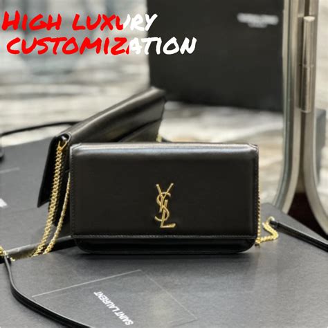 YSL Cassandre Phone Holder In Shiny Crocodile.